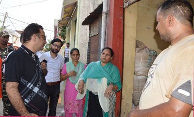 Food Minister Ch Zulfkar interacting with consumers during inspection of Fair Price Shops. Food Minister Ch Zulfkar interacting with consumers during inspection of Fair Price Shops.
