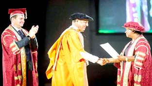 SP Varma being conferred honorary doctorate by UK University. SP Varma being conferred honorary doctorate by UK University.