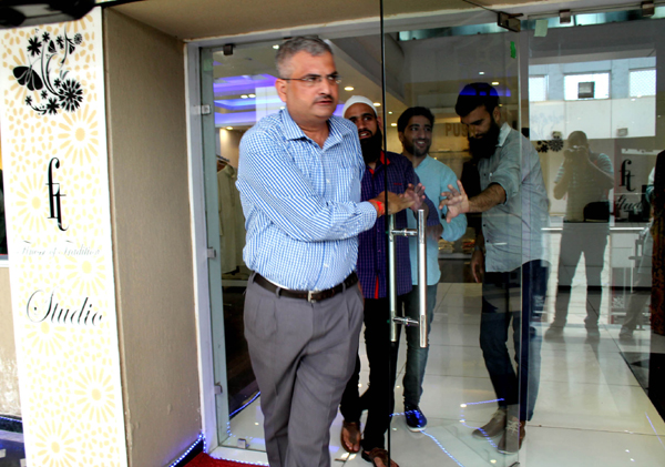 An Enforcement Directorate official coming out of Al-Khudam Tour and Travels and Hajj and Umrah service providers, at Sangarmal Complex in Srinagar after conducting raid on the headquarters alongwith Crime Branch of Jammu and Kashmir Police on Thursday. (UNI) An Enforcement Directorate official coming out of Al-Khudam Tour and Travels and Hajj and Umrah service providers, at Sangarmal Complex in Srinagar after conducting raid on the headquarters alongwith Crime Branch of Jammu and Kashmir Police on Thursday. (UNI)