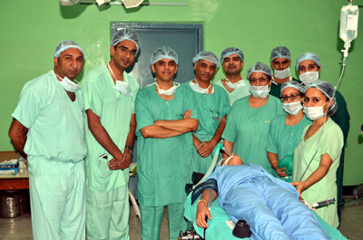 A team of doctors at ASCOMS Hospital which performed Bilateral Cochlear implant surgery posing with patient. A team of doctors at ASCOMS Hospital which performed Bilateral Cochlear implant surgery posing with patient.