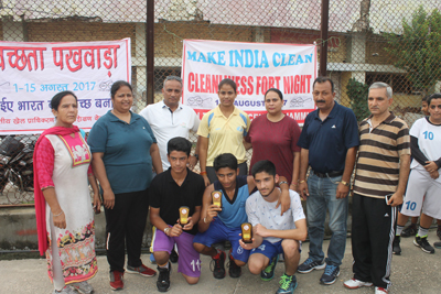 Winners of essay competition posing for a photograph along with dignitaries at M.A Stadium in Jammu. Winners of essay competition posing for a photograph along with dignitaries at M.A Stadium in Jammu.