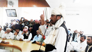 PCC chief GA Mir addressing public meeting in Rajouri. PCC chief GA Mir addressing public meeting in Rajouri.
