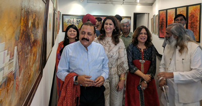 Union Minister Dr Jitendra Singh going around an exhibition of paintings put up by noted artist Shuchi Khanna at New Delhi on Sunday. Union Minister Dr Jitendra Singh going around an exhibition of paintings put up by noted artist Shuchi Khanna at New Delhi on Sunday.