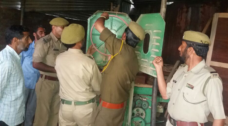 Forest team seizing tools during raid at illegal saw mill at Kotranka on Tuesday. Forest team seizing tools during raid at illegal saw mill at Kotranka on Tuesday.