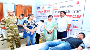 A donor donating blood during a camp organised by Solar Power Station at Jyotipuram. A donor donating blood during a camp organised by Solar Power Station at Jyotipuram.