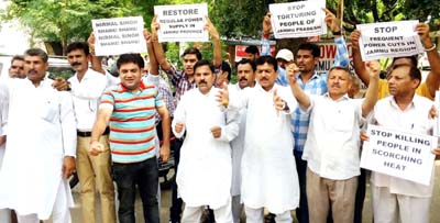 NPP workers staging protest near Press Club in Jammu on Friday. NPP workers staging protest near Press Club in Jammu on Friday.