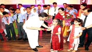 Minister for Education, Altaf Bukhari interacting with a child during Annual Day function at Minto Circle Higher Secondary School, Alochibagh, Srinagar. Minister for Education, Altaf Bukhari interacting with a child during Annual Day function at Minto Circle Higher Secondary School, Alochibagh, Srinagar.