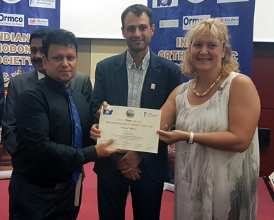 Dr Eva Sramkova, President of Czech Orthodontic Society, presenting Certificate of Appreciation to Dr Akshay Gupta during an International Conference at Prague. Dr Eva Sramkova, President of Czech Orthodontic Society, presenting Certificate of Appreciation to Dr Akshay Gupta during an International Conference at Prague.