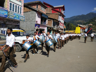 RSS volunteers taking out route march in Bhaderwah on Saturday. -Excelsior/Tilak Raj RSS volunteers taking out route march in Bhaderwah on Saturday. -Excelsior/Tilak Raj
