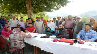 HoD Cardiology GMC Jammu Dr Sushil Sharma examining patients at Latti in Udhampur on Sunday. HoD Cardiology GMC Jammu Dr Sushil Sharma examining patients at Latti in Udhampur on Sunday.