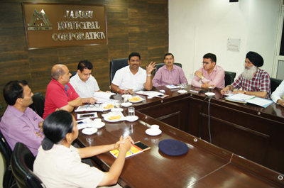 JMC Commissioner, M Raju chairing a meeting on Friday. JMC Commissioner, M Raju chairing a meeting on Friday.