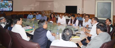 Minister for Finance, Dr Haseeb A Drabu chairing a meeting at Srinagar on Thursday. Minister for Finance, Dr Haseeb A Drabu chairing a meeting at Srinagar on Thursday.