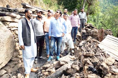 MLC Firdous Tak during visit to fire affected Tunder village of Dachan. MLC Firdous Tak during visit to fire affected Tunder village of Dachan.