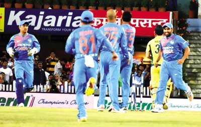 Indian Players celebrate after the wicket of Australia's David Warner during 1st T-20 match at JSCA Stadium in Ranchi, Jharkhand on Saturday. (UNI) Indian Players celebrate after the wicket of Australia's David Warner during 1st T-20 match at JSCA Stadium in Ranchi, Jharkhand on Saturday. (UNI)