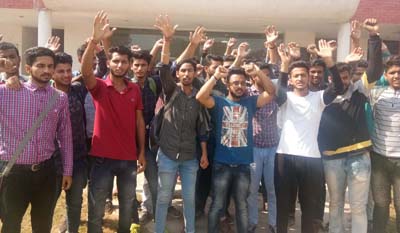 JJSF members raising slogans during protest outside JKCA office in GGM Science College at Jammu on Friday. JJSF members raising slogans during protest outside JKCA office in GGM Science College at Jammu on Friday.