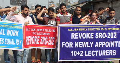 Newly selected Lecturers protesting for revocation of SRO-202. Newly selected Lecturers protesting for revocation of SRO-202.
