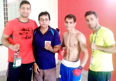 Boxer Pradeep posing along with coach and other dignitaries after entering semifinals of Sr National at Visakhapatnam in Andhra Pradesh. Boxer Pradeep posing along with coach and other dignitaries after entering semifinals of Sr National at Visakhapatnam in Andhra Pradesh.