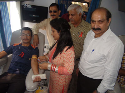 A youth donating blood during a camp at Government MAM College, Jammu. A youth donating blood during a camp at Government MAM College, Jammu.