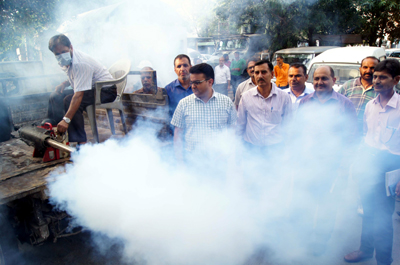 JMC officials during thermal fogging in Jammu city. JMC officials during thermal fogging in Jammu city.