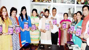 Forest Minister Choudhary Lal Singh releasing a book on Monday. Forest Minister Choudhary Lal Singh releasing a book on Monday.