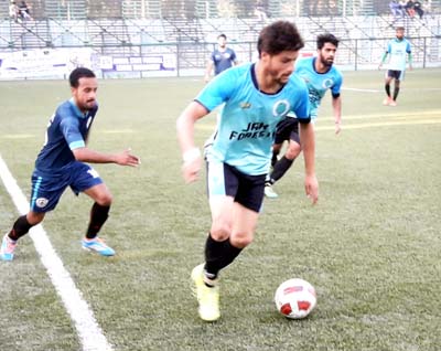 Players in action during a match of State Football League 2017 at TRC ground in Srinagar. Players in action during a match of State Football League 2017 at TRC ground in Srinagar.