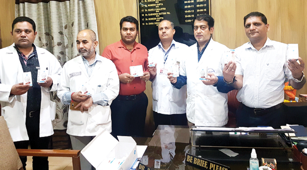 page13 Representatives of Sehyog handing over LED blubs to Dr Dara Singh, Medical Superintendent GMC, Jammu on Monday. -Excelsior/Rakesh
