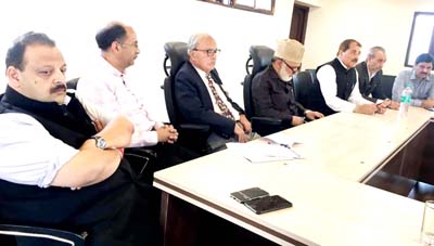 NC leaders at a meeting in Srinagar on Monday. NC leaders at a meeting in Srinagar on Monday.
