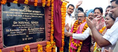 DyCM Dr Nirmal Singh inaugurating sun shade at Bawe Wali Mata Temple on Tuesday. DyCM Dr Nirmal Singh inaugurating sun shade at Bawe Wali Mata Temple on Tuesday.