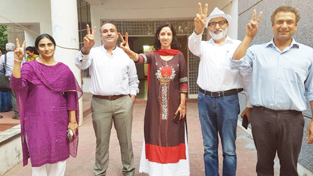 Newly elected JUTA team displaying sign of victory after declaration of results. Newly elected JUTA team displaying sign of victory after declaration of results.