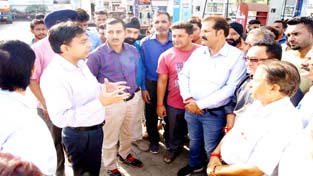 JMC officials interacting with shopkeepers. JMC officials interacting with shopkeepers.