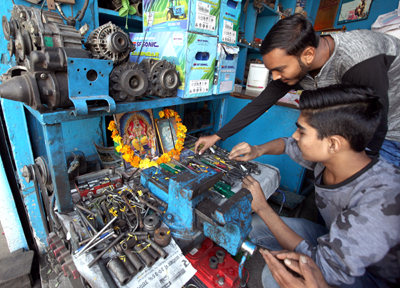 Pooja being performed to commemorate Vishwakarma Day at Jammu on Friday. -Excelsior/Rakesh Pooja being performed to commemorate Vishwakarma Day at Jammu on Friday. -Excelsior/Rakesh
