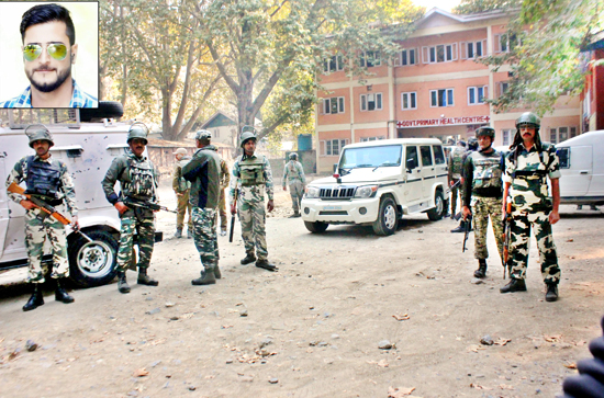 Para-military personnel in Anantnag after militant attack on Thursday. (Inset) Gowhar Ahmad Bhat. -Excelsior/Sajad Dar Para-military personnel in Anantnag after militant attack on Thursday. (Inset) Gowhar Ahmad Bhat. -Excelsior/Sajad Dar
