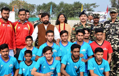 Young Footballers posing alongwith Minister for Forests Ch. Lal Singh in Kathua on Monday. Young Footballers posing alongwith Minister for Forests Ch. Lal Singh in Kathua on Monday.