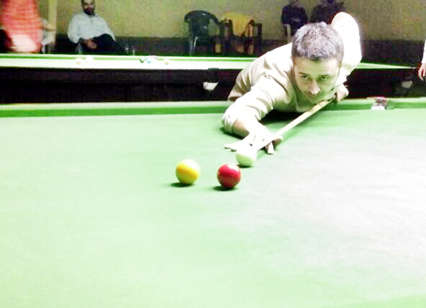 Cueist in action during a semifinal match of State Senior Billiards Championship in Jammu. Cueist in action during a semifinal match of State Senior Billiards Championship in Jammu.