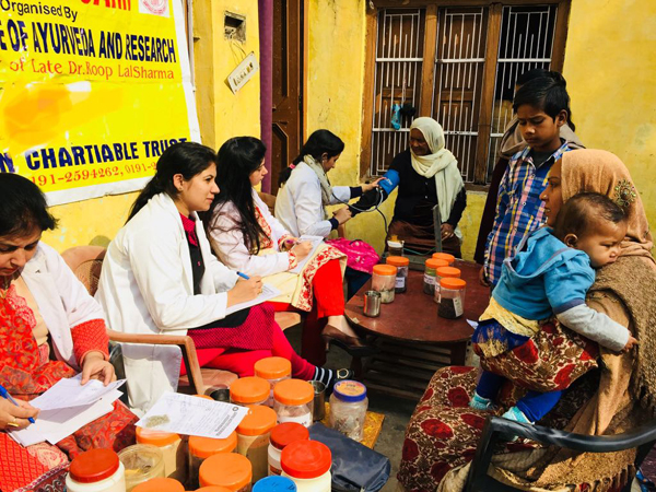 Doctors and patients during a gynaecology medical camp at Raipur in outskirts of Jammu. Doctors and patients during a gynaecology medical camp at Raipur in outskirts of Jammu.