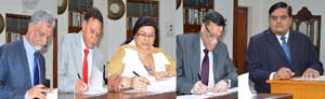Chief Secretary BB Vyas administering oath of office to Chairperson & members of SWRRA at Jammu on Wednesday. Chief Secretary BB Vyas administering oath of office to Chairperson & members of SWRRA at Jammu on Wednesday.