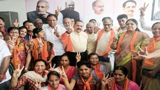 Union Minister Dr Jitendra Singh, flanked by BJP leaders and Karyakartas, during his visit to the Varacher Assembly constituency in Surat, Gujarat, on Thursday. Union Minister Dr Jitendra Singh, flanked by BJP leaders and Karyakartas, during his visit to the Varacher Assembly constituency in Surat, Gujarat, on Thursday.