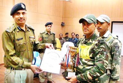 DIG Operations CRPF SK Mishra presenting trophy and a certificate to a trainee at Jammu. DIG Operations CRPF SK Mishra presenting trophy and a certificate to a trainee at Jammu.