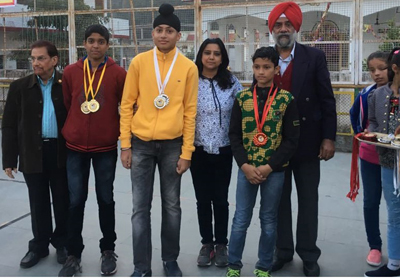 Medal winners of State Roller Skating Championship posing for a group photograph. Medal winners of State Roller Skating Championship posing for a group photograph.