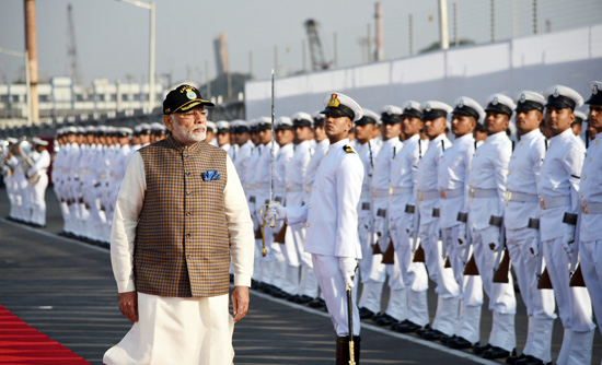 Prime Minister, Narendra Modi inspecting the Guard of Honour, at the commissioning ceremony of the Naval Submarine INS Kalvari into the Indian Navy, in Mumbai on Thursday.