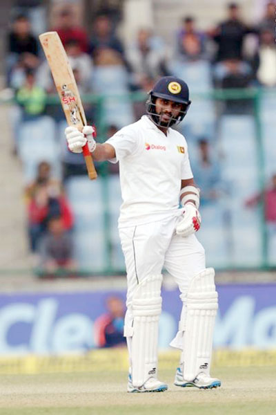 Sri Lanka’s Roshen Silva celebrates his half century. Sri Lanka’s Roshen Silva celebrates his half century.