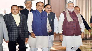Prime Minister Narendra Modi arriving at Parliament House to attend the BJP Parliamentary Party meeting on Wednesday. Also seen are Union Ministers Ananth Kumar and Dr Jitendra Singh. Prime Minister Narendra Modi arriving at Parliament House to attend the BJP Parliamentary Party meeting on Wednesday. Also seen are Union Ministers Ananth Kumar and Dr Jitendra Singh.