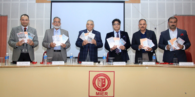 Former DGP Kuldeep Khoda and others launching books at MIER on Tuesday. Former DGP Kuldeep Khoda and others launching books at MIER on Tuesday.