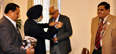 Governor NN Vohra being pinned flag on Armed Forces Flag Day at Jammu on Thursday. Governor NN Vohra being pinned flag on Armed Forces Flag Day at Jammu on Thursday.