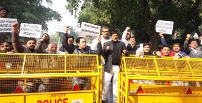 NPP activists from J&K protesting outside BJP headquarters in Delhi on Thursday. NPP activists from J&K protesting outside BJP headquarters in Delhi on Thursday.