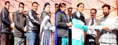 Forest Minister Lal Singh giving regularization orders to adhoc employees on Monday. Forest Minister Lal Singh giving regularization orders to adhoc employees on Monday.