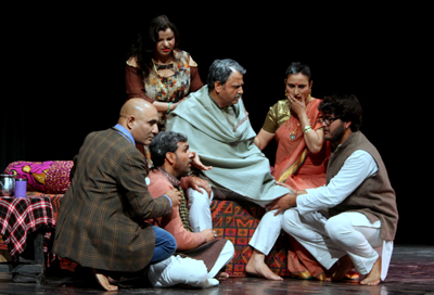 A scene of the play ‘Rovmut Bhatta’ staged by Vomedh Rangmanch. A scene of the play ‘Rovmut Bhatta’ staged by Vomedh Rangmanch.