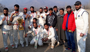 Winners of Shaheed Moomin Cup Cricket Tournament posing for a group photograph in Srinagar. Winners of Shaheed Moomin Cup Cricket Tournament posing for a group photograph in Srinagar.