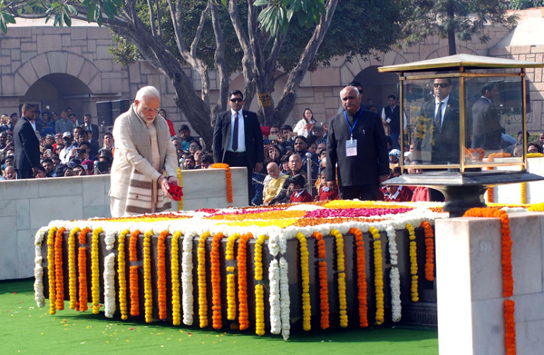 Prime Minister Narendra Modi paying tribute to Father of the Nation Mahatma Gandhi on Martyrs Day at Rajghat, in New Delhi on Tuesday. (UNI) Prime Minister Narendra Modi paying tribute to Father of the Nation Mahatma Gandhi on Martyrs Day at Rajghat, in New Delhi on Tuesday. (UNI)