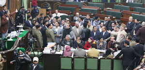 Opposition MLAs protesting in the Well of House as Speaker Kavinder Gupta is seen trying to persuade them on Wednesday. —Excelsior/Rakesh Opposition MLAs protesting in the Well of House as Speaker Kavinder Gupta is seen trying to persuade them on Wednesday. —Excelsior/Rakesh